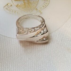 Modern Silver Ring with Intricate Design and Unique Shape